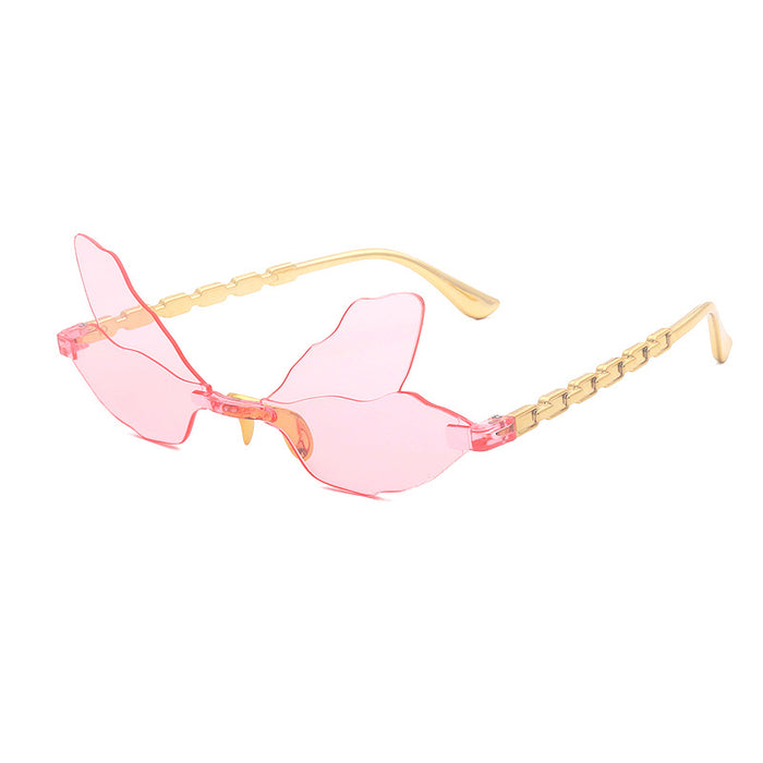 Wholesale Dragonfly shaped frameless sunglasses, personalized, penetrating, funny, decorative sunglasses