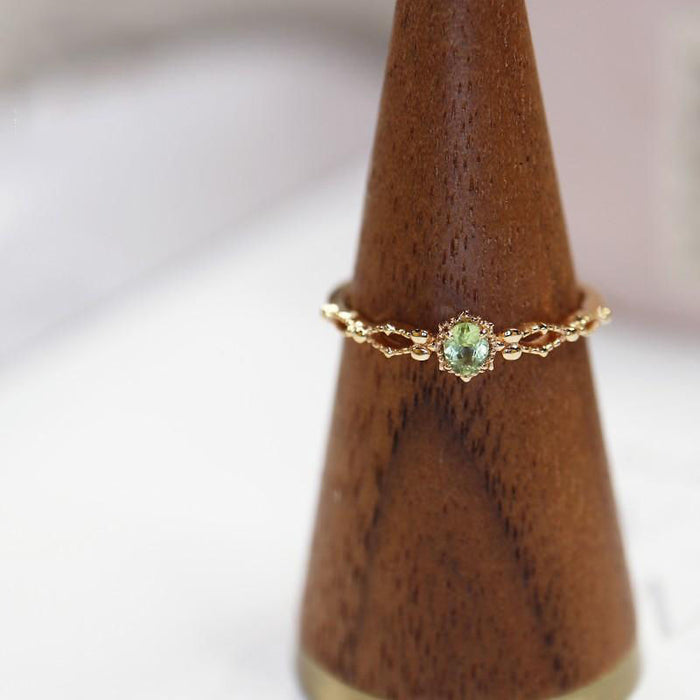 Wholesale Olivine ring hollowed out zircon adjustable ring gold plating niche design