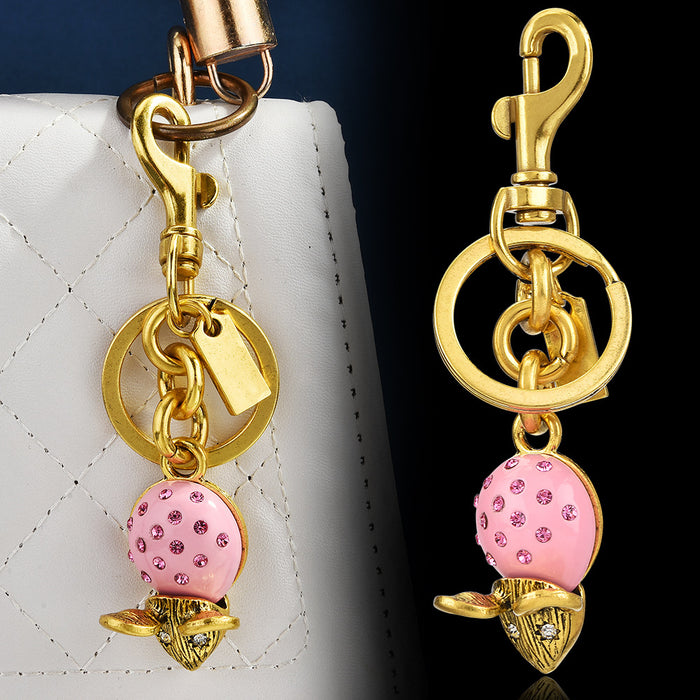 Wholesale Metal keychain with a diamond-encrusted mouse design.
