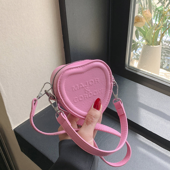 Wholesale New embossed letter love bag for children, stylish mini crossbody bag, hand-held bag