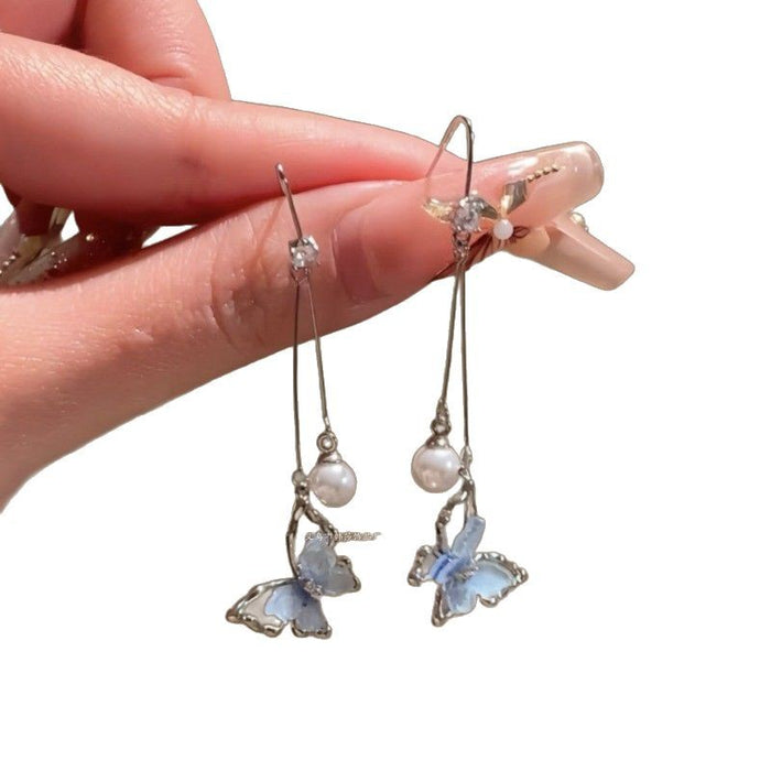 Wholesale Butterfly pearl tassel earrings with unique temperament, new earrings with distinctive features