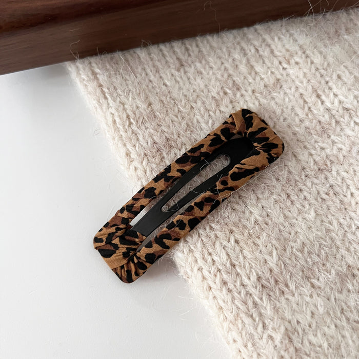Wholesale Retro leopard print bangs clip, simple and stylish style, edge clip, broken hair clip, hair clip