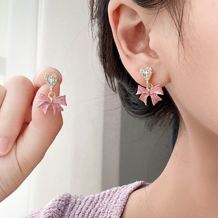 Wholesale Bow painted oil earrings set with diamonds, high-end earrings