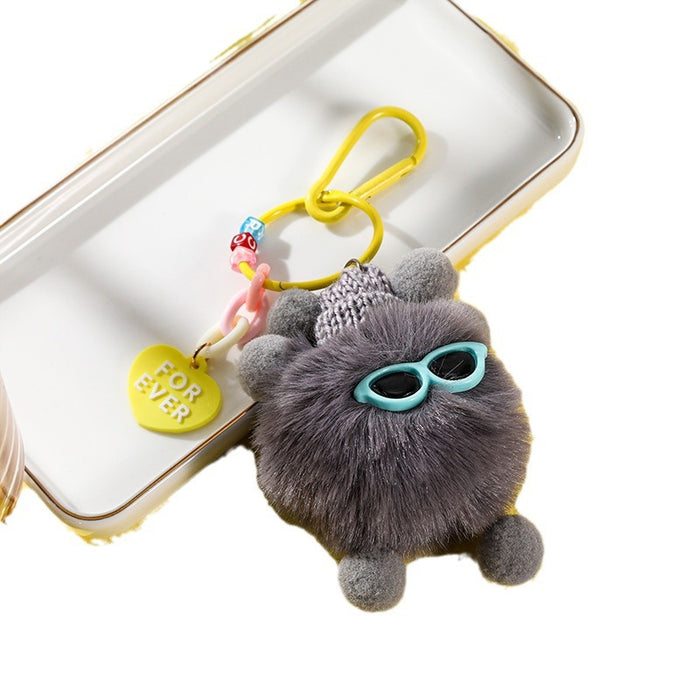 Wholesale Cute pet small bristle monster doll pendant anti-lost keychain schoolbag plush ornaments super cute gift