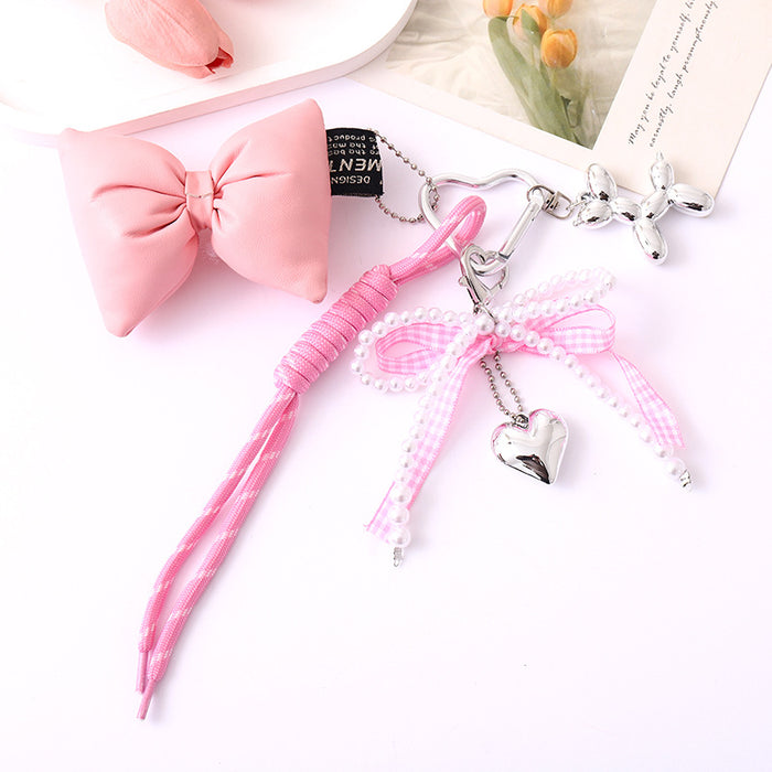 Wholesale Leather bow heart pendant luggage keychain lanyard accessories single buckle tassel pendant accessories