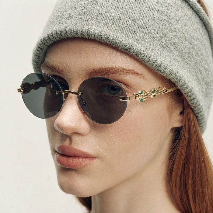 Wholesale Oval Frameless Retro Hip Hop Sunglasses for Travel Outdoor Trendy