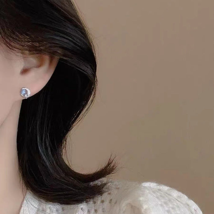 Wholesale Blue cat eye earrings, silver needles, niche temperament earrings, women's earrings