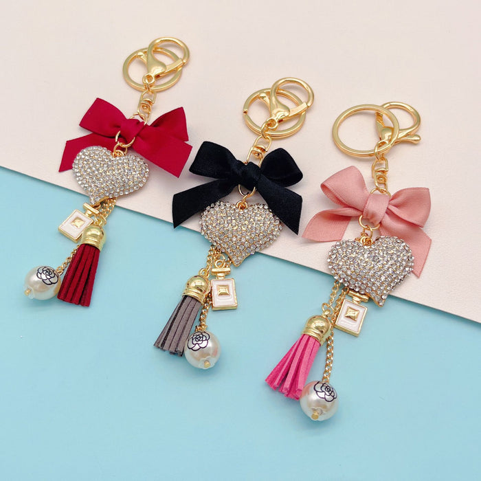 Wholesale Bow Perfume Bottle Tassel Rhinestone Heart Zinc Alloy Keychain JDC-KC-ZhanLun009