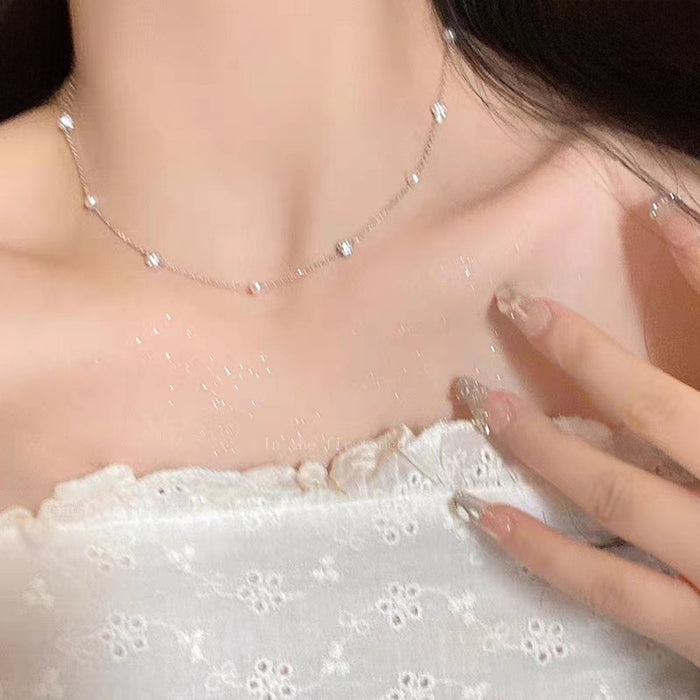 Wholesale Titanium steel pearl bead necklace new light luxury design collarbone chain niche versatile sweater chain accessory