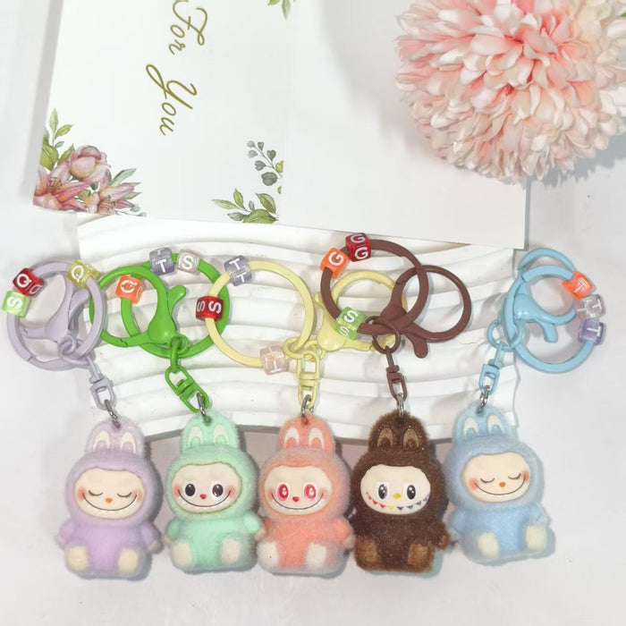 Wholesale flocked cute key doll keychain