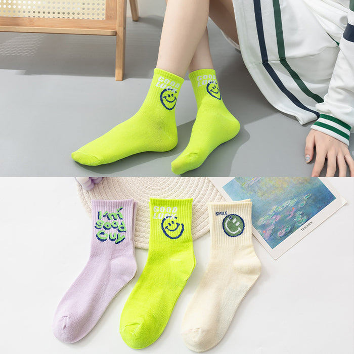 Wholesale of 10pcs Solid Color Knitted Smiling Face Mid Length Socks JDC-SK-Miqi007