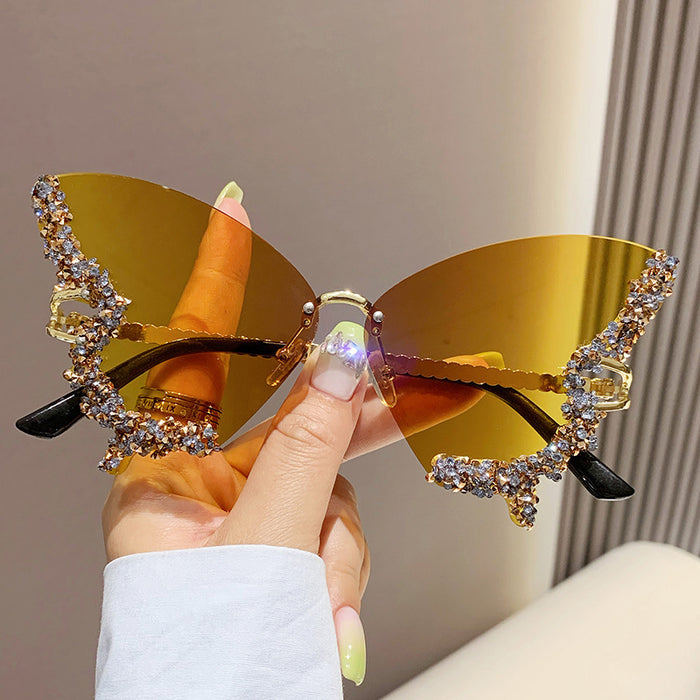 Wholesale Butterfly Shape Diamond Frameless PC Sunglasses JDC-SG-MNY001