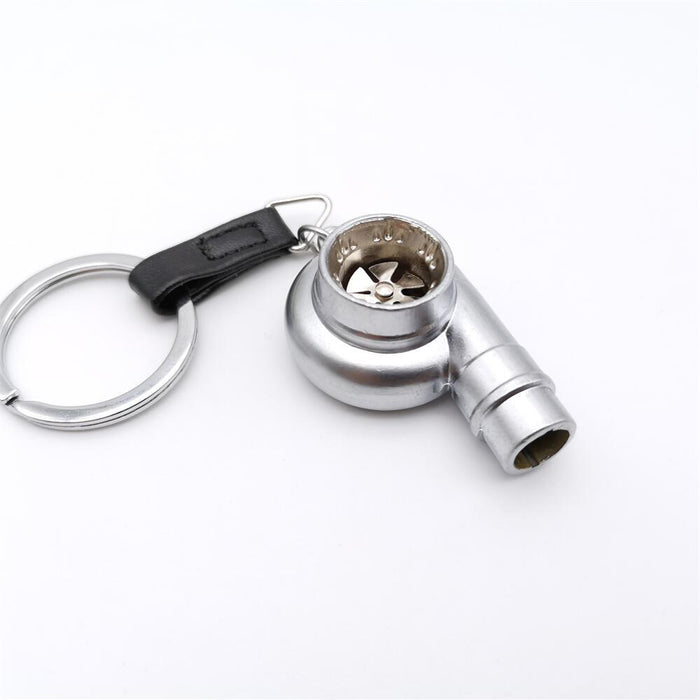 Wholesale Zinc alloy blades rotate on this car turbocharger shaped metal alloy keychain