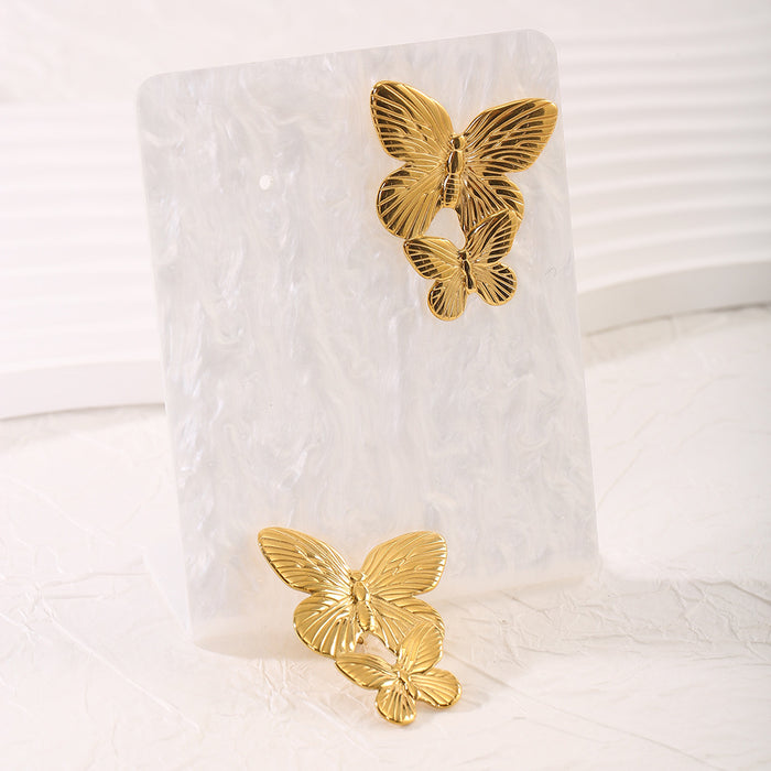 Wholesale Exaggerated personality stainless steel butterfly necklace ring earring set