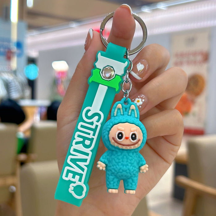 Wholesale Cute cartoon silicone keychain with cute little monster keychain for sweatshirt