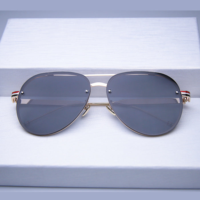 Wholesale High definition frameless sunglasses, trendy and fashionable sunglasses, UV resistant and strong light resistant glasses