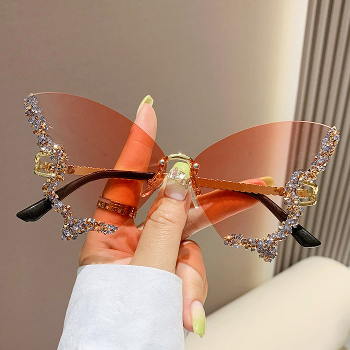 Wholesale New butterfly studded diamond rimless sunglasses with fashionable and exaggerated personality