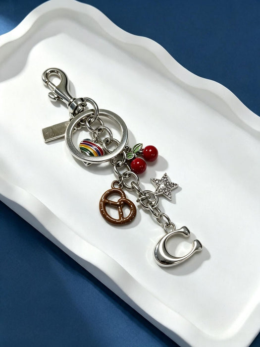 Wholesale Retro Sweet Style Alloy Pretzel Star Pendant Bag Charm Keychain Electroplated Gold Car Key Accessory