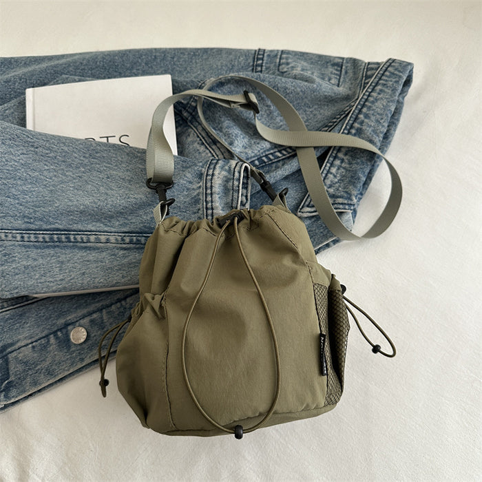 Wholesale Small niche design drawstring bucket bag, outdoor sports, leisure, fashion, versatile nylon crossbody bag
