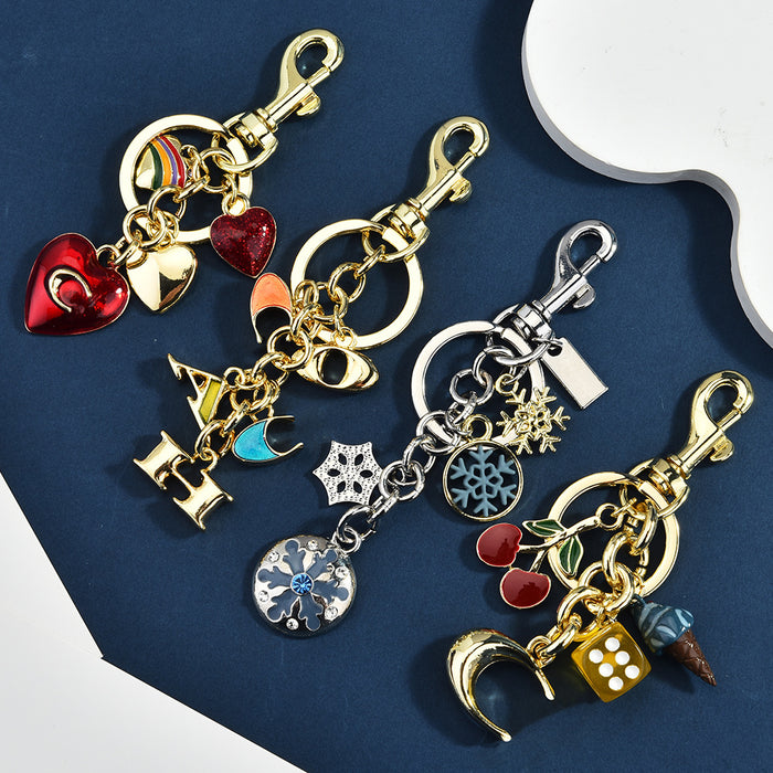 Wholesale Stylish Metal Bag Charm Keychain With Fruit Pattern And Alphabet Pendant For Car Keys And Bags