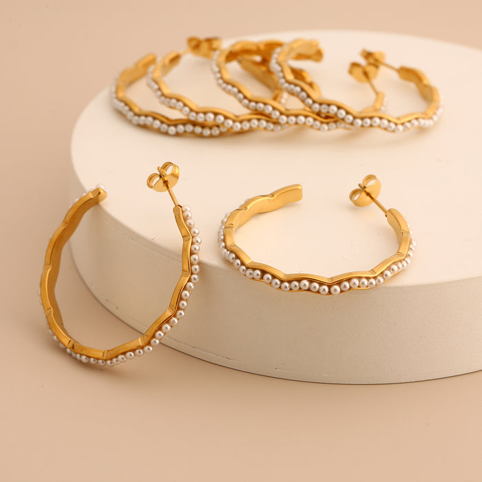 Wholesale Original design: Stainless steel earrings inlaid with pearls, personalized, luxurious, and high-end. Earrings with color preservation and electroplating wholesale