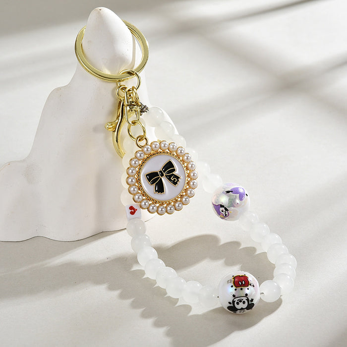 Wholesale Glass bead round brand bow keychain