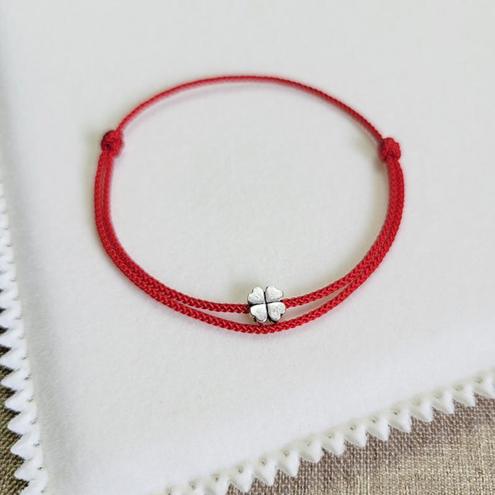 Wholesale Red rope bracelet with four leaf clover simple weaving and thin hand rope, a pair of red rope commemorative gifts