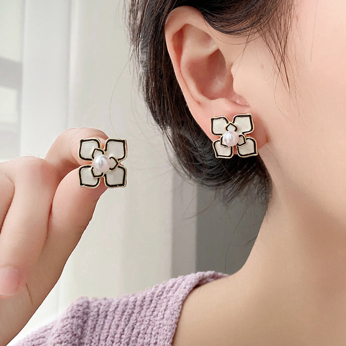 Wholesale New oil dripping pearl flower earrings with a niche design and high-end earring temperament