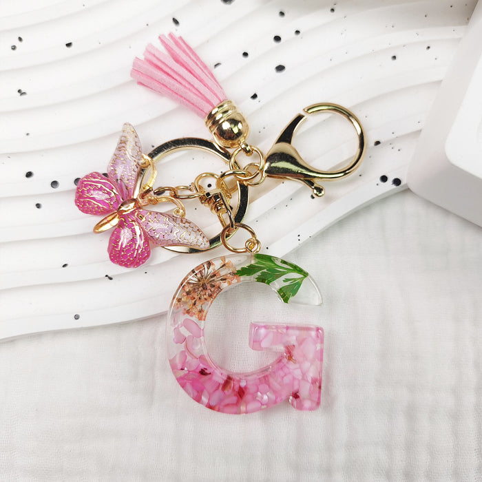 Wholesale Small Daisy Dried Flower Green Leaf Crystal Acrylic Letter Butterfly Tassel Keychain JDC-KC-JiaYi002