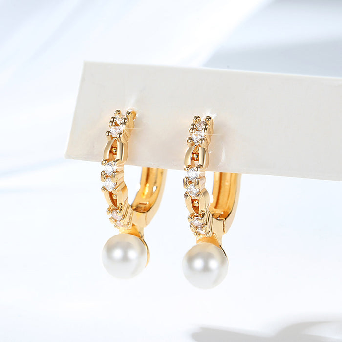 Wholesale Copper gold-plated retro light luxury simple pearl earrings, small and fashionable design, inlaid with zircon ear buckles, wholesale of ear accessories