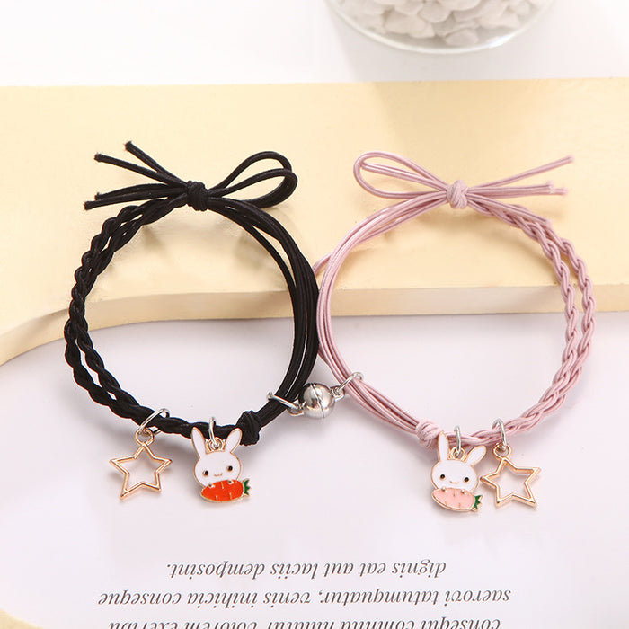 Wholesale Cartoon couple bracelets a pair of small rubber band magnets attract bell bracelet gift