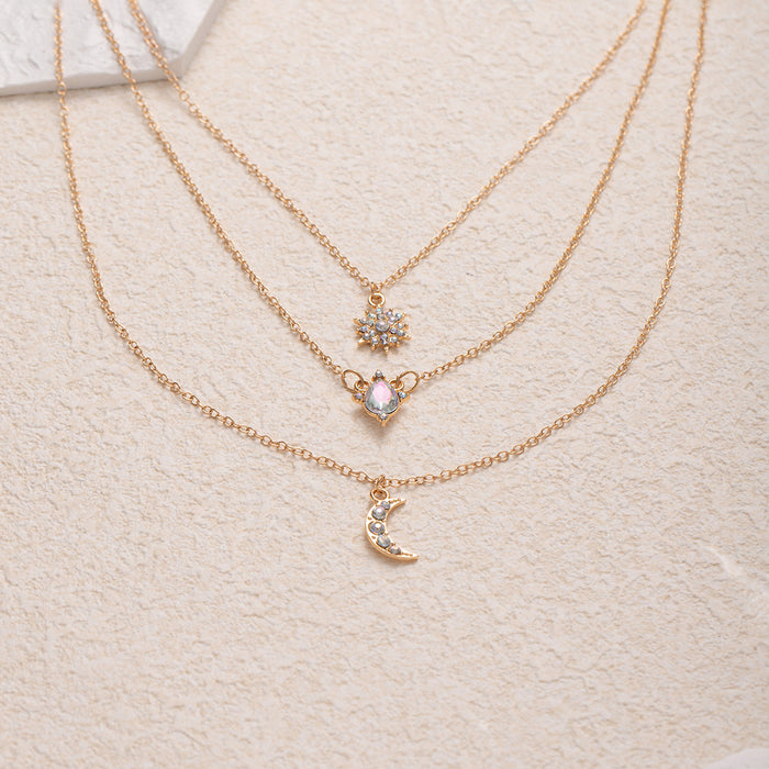Wholesale Popular retro multi-layer layered star moon necklace with light luxury design and diamond studded water droplet pendant