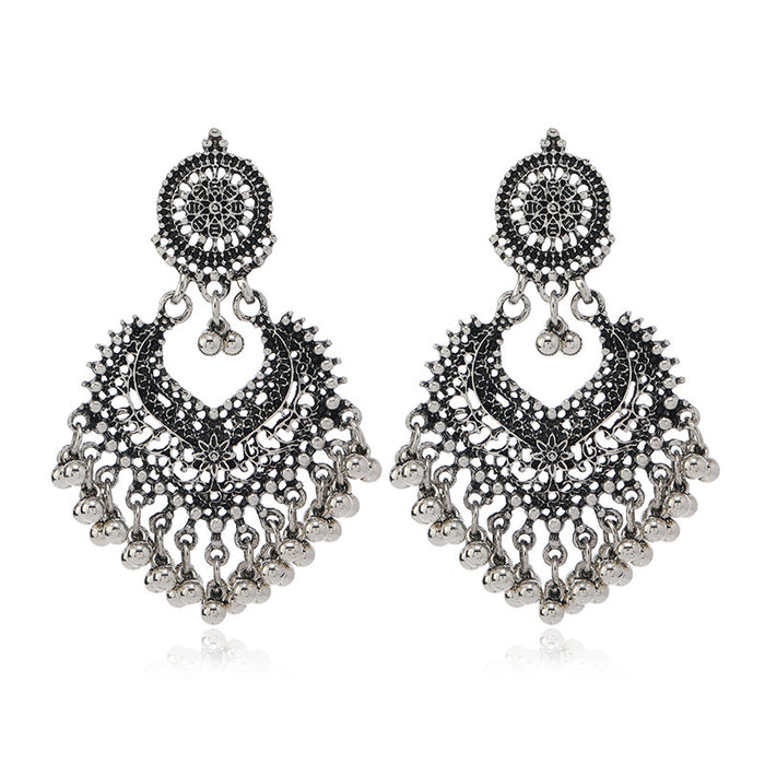 Wholesale Retro Bohemian ethnic style earrings for women exaggerated temperament hollow heart earrings long bell India