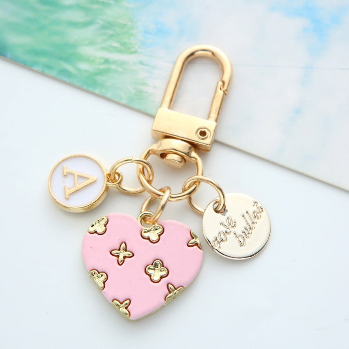 Wholesale alloy love keychain pendant hollow small flower letter round card accessories