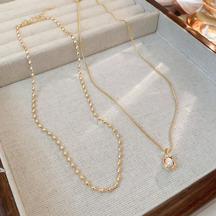 Wholesale Zircon pearl pendant, double-layer layered collarbone chain, high-end, light luxury, fashionable, personalized necklace accessories