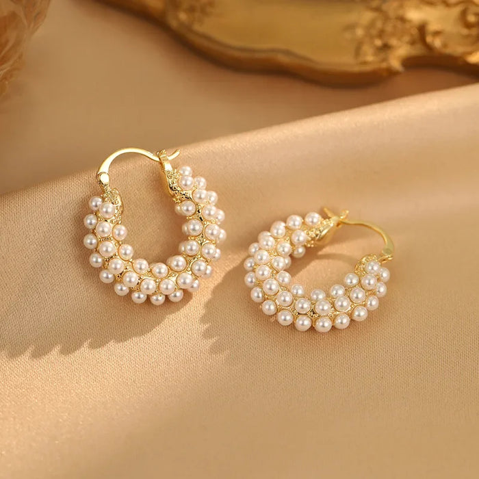Wholesale Exquisite, fashionable, high-end pearl round ear buckle, light luxury, niche design, fashionable, gentle, versatile earrings