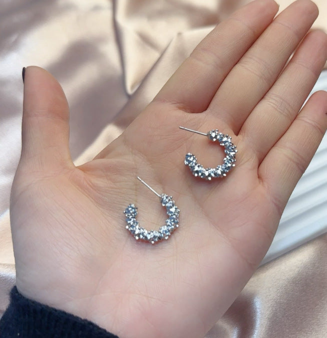 Wholesale Gold colored plain ring earrings, elegant earrings, studs, niche design, high-end ear rings, and earrings