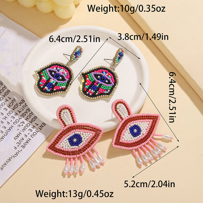 Wholesale Pink Devil' s Eye Rice Bead Earrings