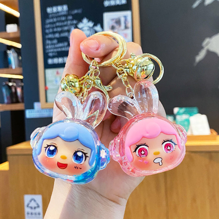 Wholesale Oil-flow sand earphone rabbit keychain