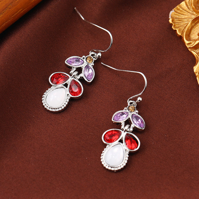 Wholesale Inlaid with colorful leaves,  crystal diamonds and moonstone earrings,  European and American creative water drop pear-shaped earrings for women