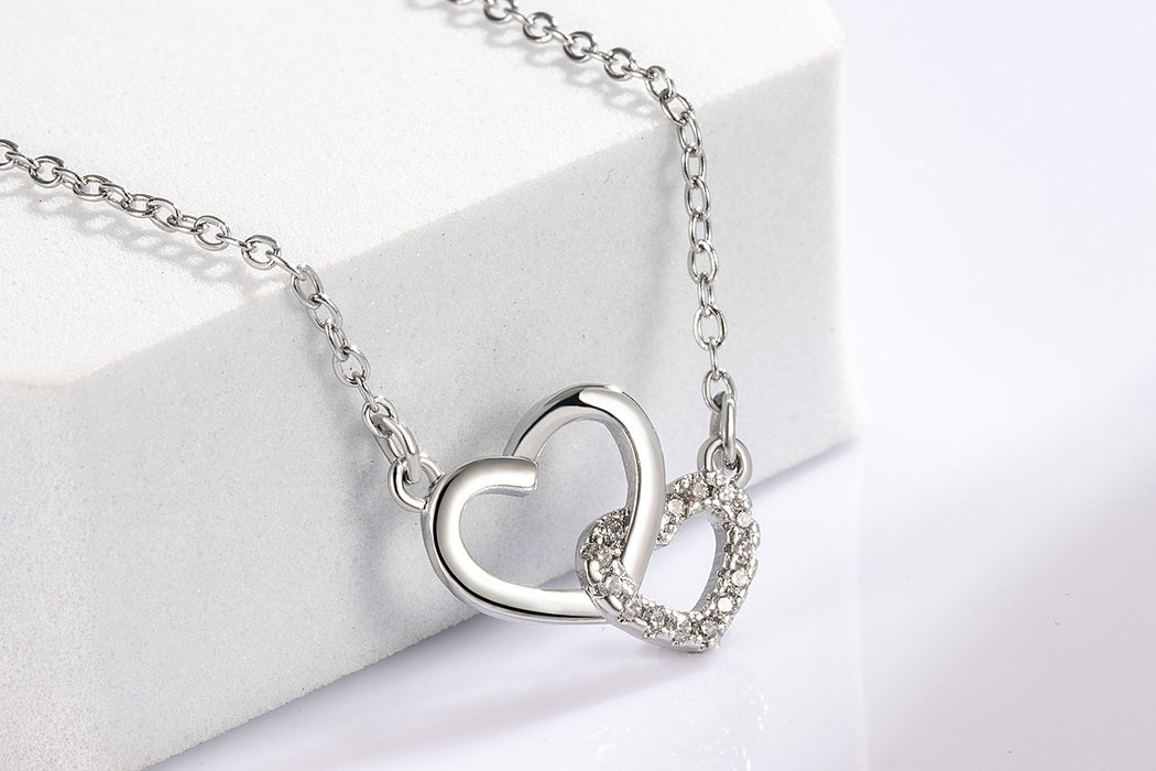 Wholesale Interlocking heart-shaped necklace with a light luxury and versatile design, exuding a high-end feel. Heart shaped collarbone chain pendant