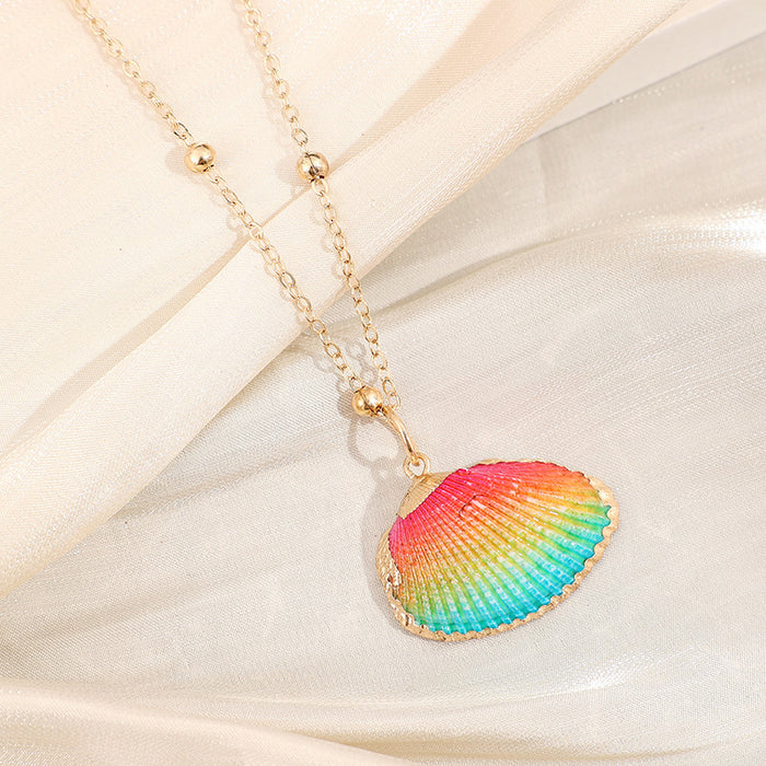 Wholesale Gold edged conch and seashell necklace
