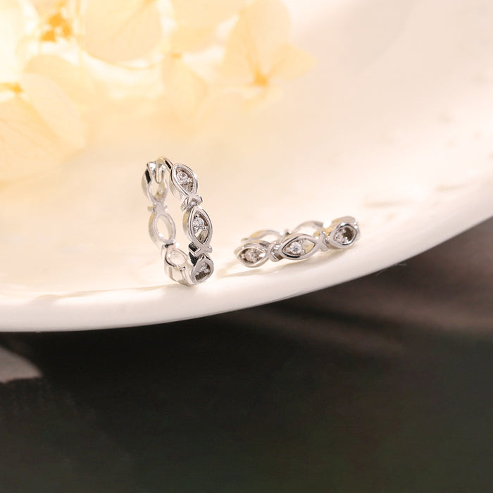 Wholesale Subtle temperament, high-end earrings, hollowed out earrings with diamond inlay