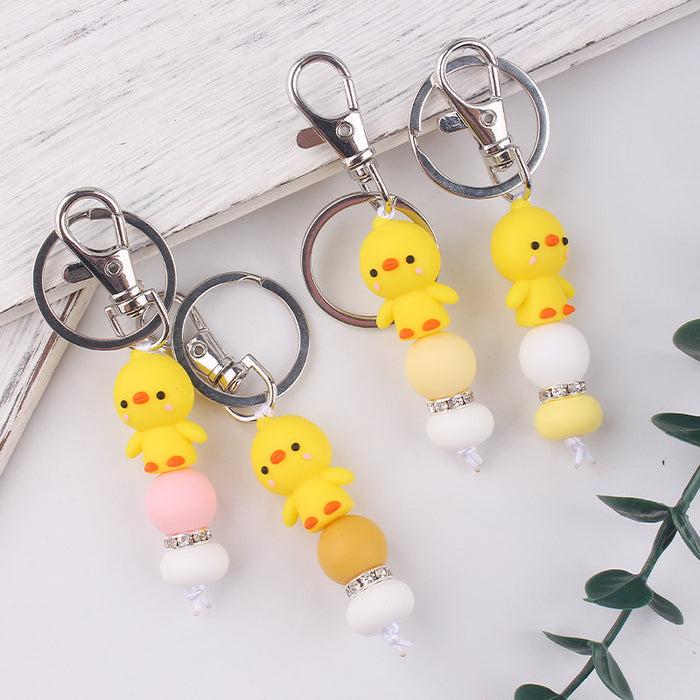 Wholesale Santa Cartoon Little Yellow Duck Silicone Beaded Keychain JDC-KC-GuangTian032