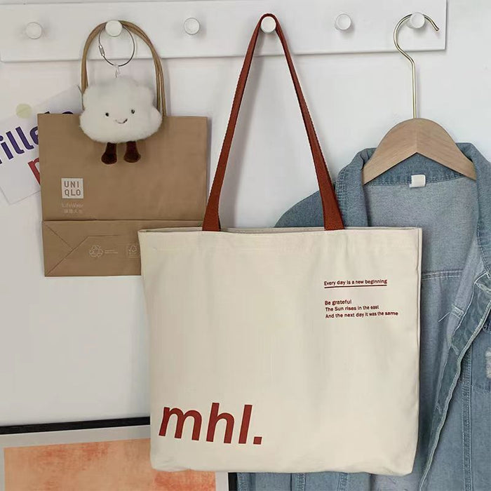 Wholesale New canvas bag, niche letter printed shoulder bag, large capacity commuting tote bag