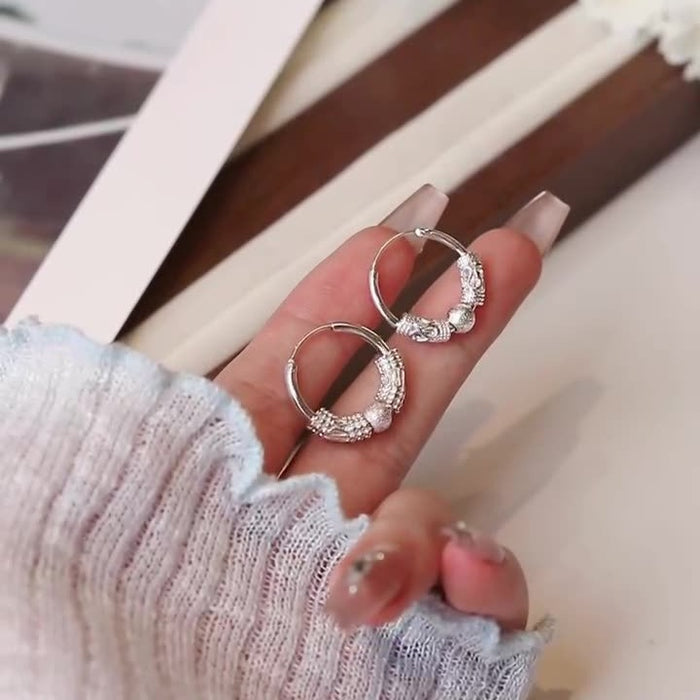 Wholesale Rotating earrings with a light luxury and niche design, simple yet fashionable and versatile earrings