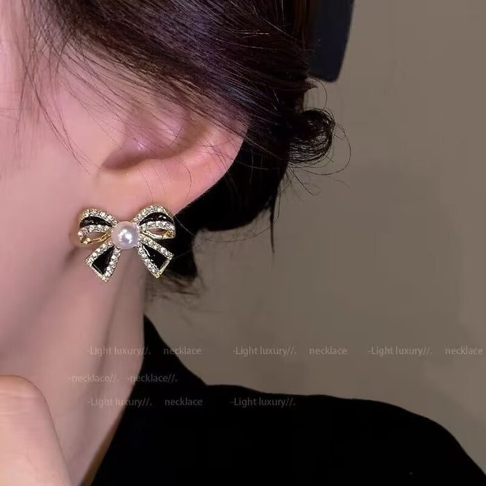Wholesale Silver needle studded diamond bow earrings, light luxury, high-end retro fashion temperament, earrings, personalized earrings wholesale