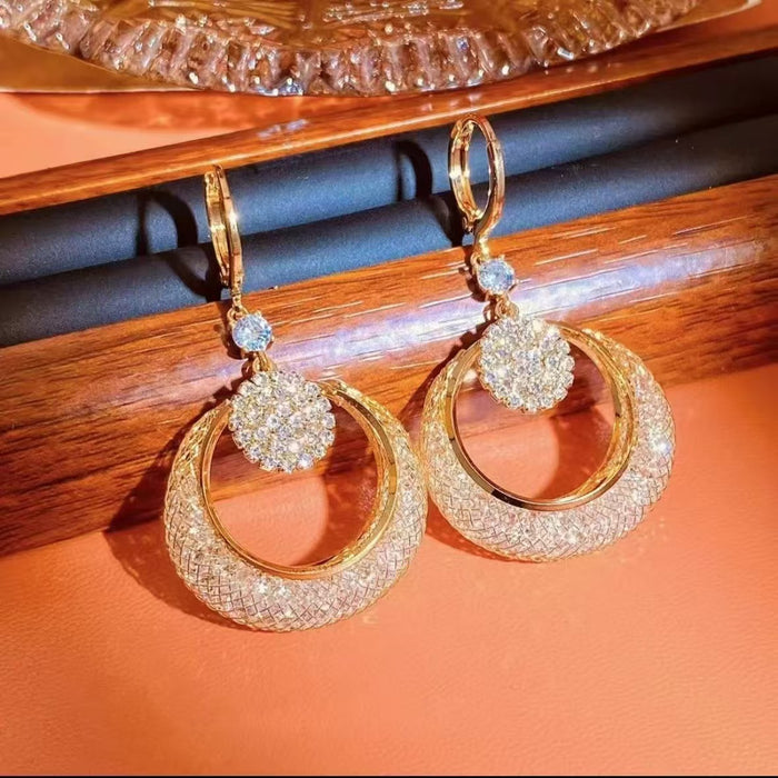 Wholesale New temperament mesh crystal cat eye stone long earrings, light luxury, high-end, personalized ear loops, fashionable and versatile