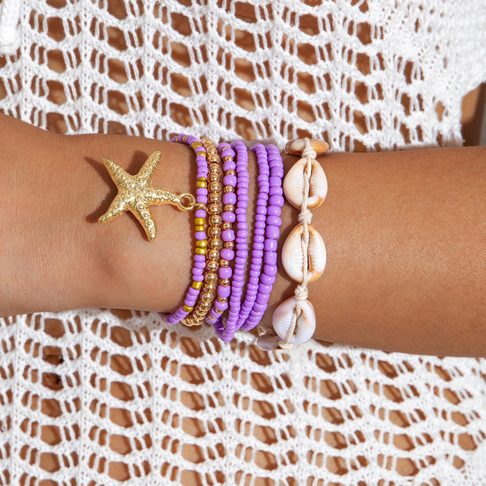 Wholesale Bohemian rice beaded multi-layer stacking elastic bracelet niche contrast color women' s bracelet set