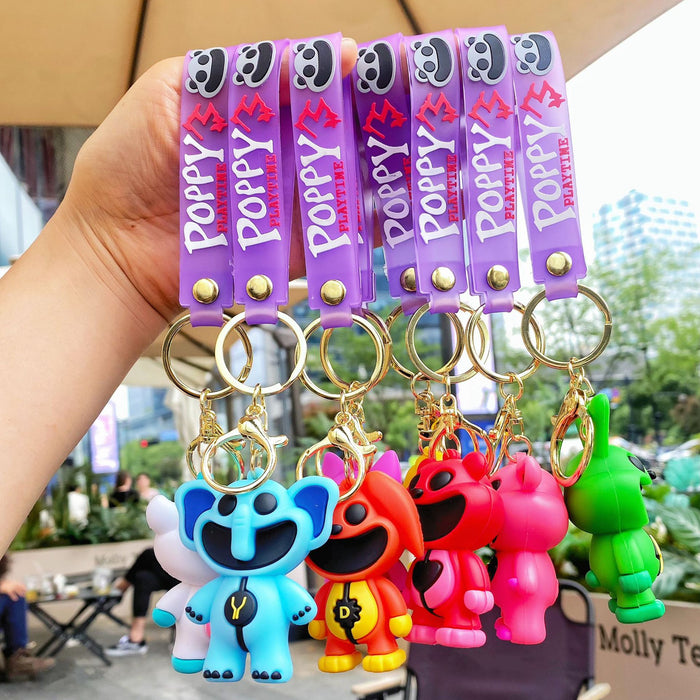Wholesale Cute silicone smiling animal keychain